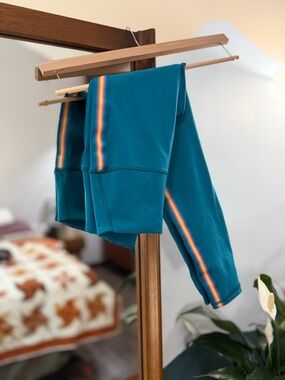 Spiritual Gangster dark teal leggings with rainbow stripe